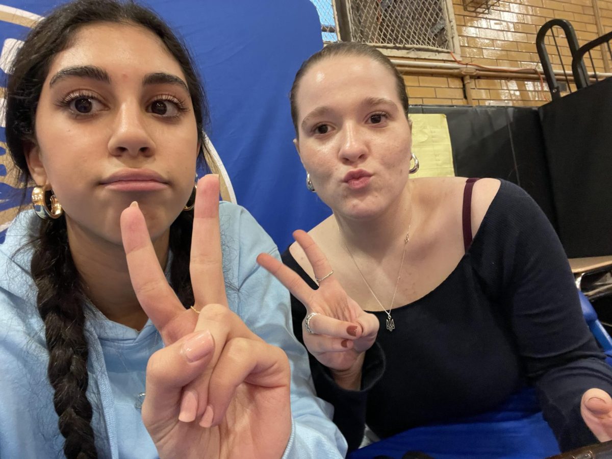 The basketball team managers showcasing their Jaguar pride.