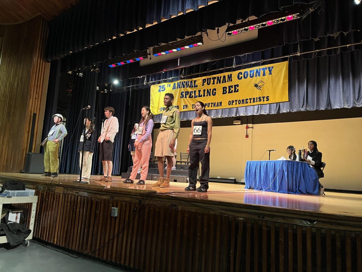 The cast performs the opening number "The 25th Annual Putnam County Spelling Bee" in a dress rehearsal.