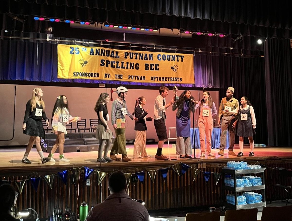 The cast performs the opening number "The 25th Annual Putnam County Spelling Bee" in a dress rehearsal.