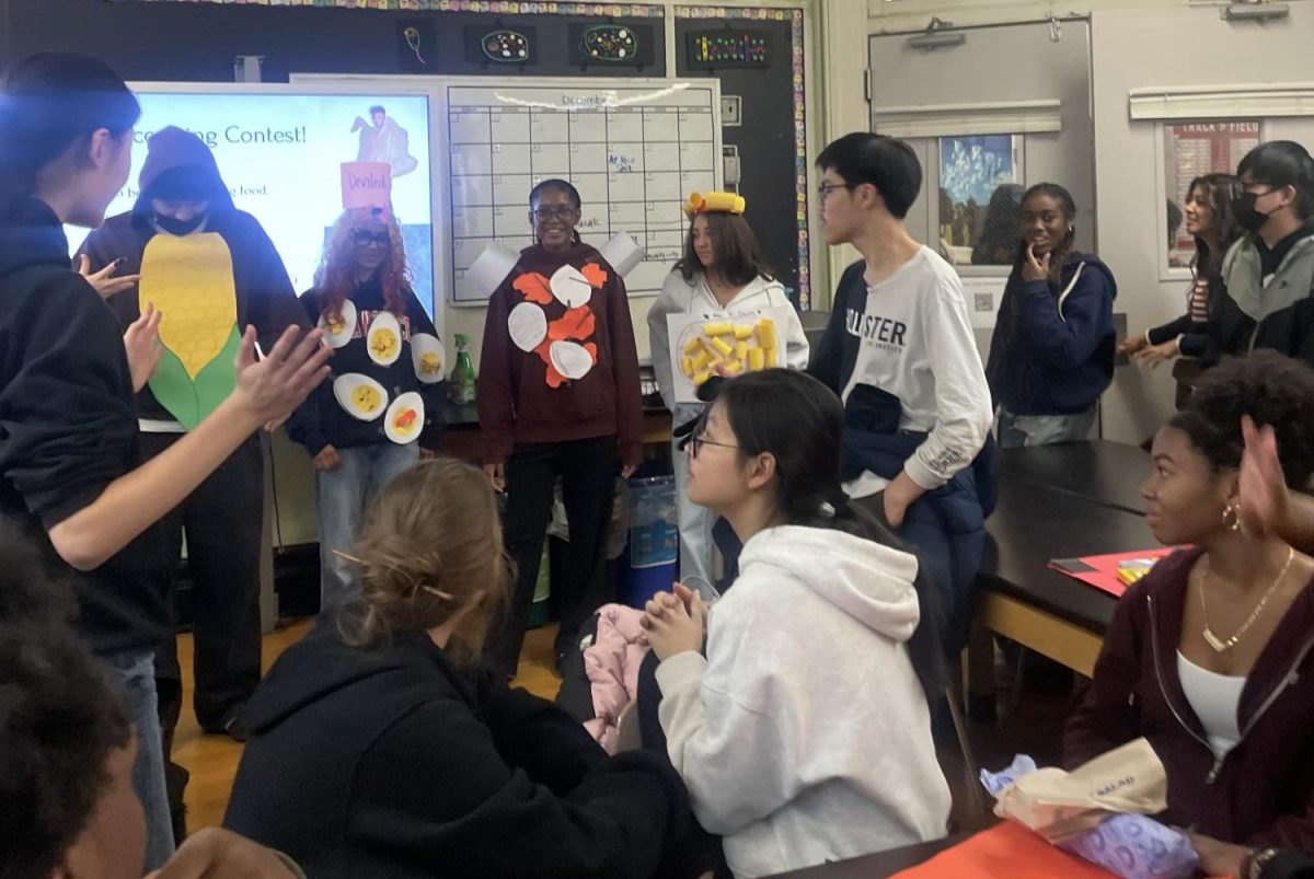 Students compete in a costume contest as classic thanksgiving foods at the second food history club meeting. 